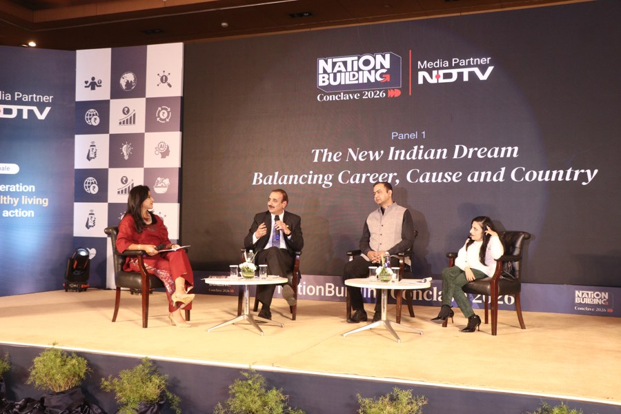 Leaders sharing their experiences on a panel